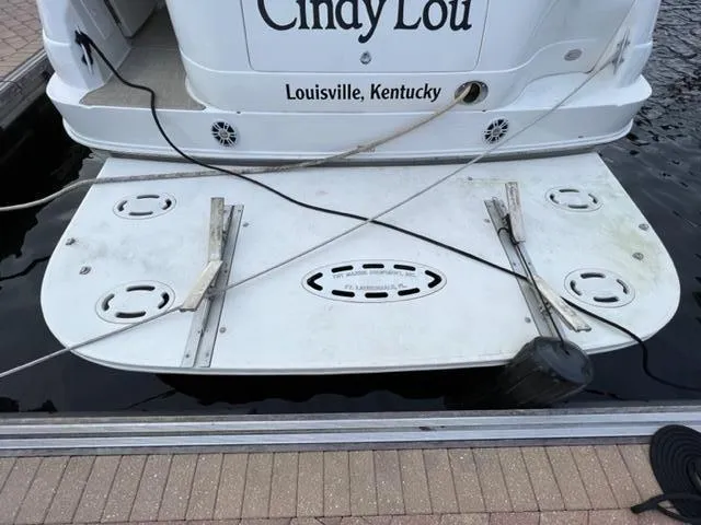 Slide: The Image of Sea Ray 460 Sundancer 2000 docked, stern view with swim platform, Louisville, Kentucky. - 4