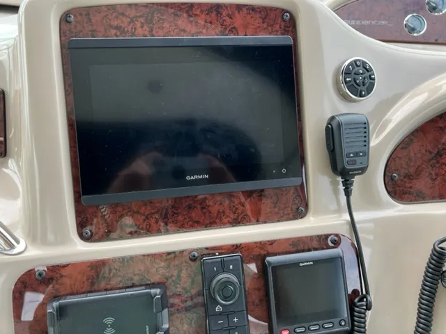 Slide: The Image of Sea Ray 460 Sundancer 2000 dashboard with Garmin navigation system. - 9