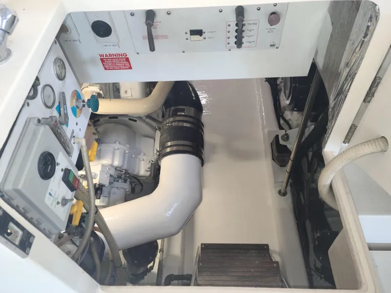 Slide: The Image of Engine room of 2000 Riviera 48 Convertible yacht. - 21