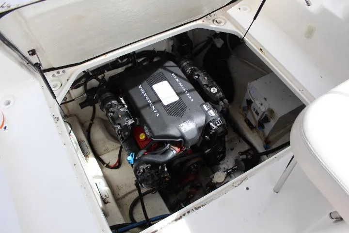 Slide: The Image of 2005 Larson Cabrio 240 boat engine compartment with Volvo Penta engine. - 19