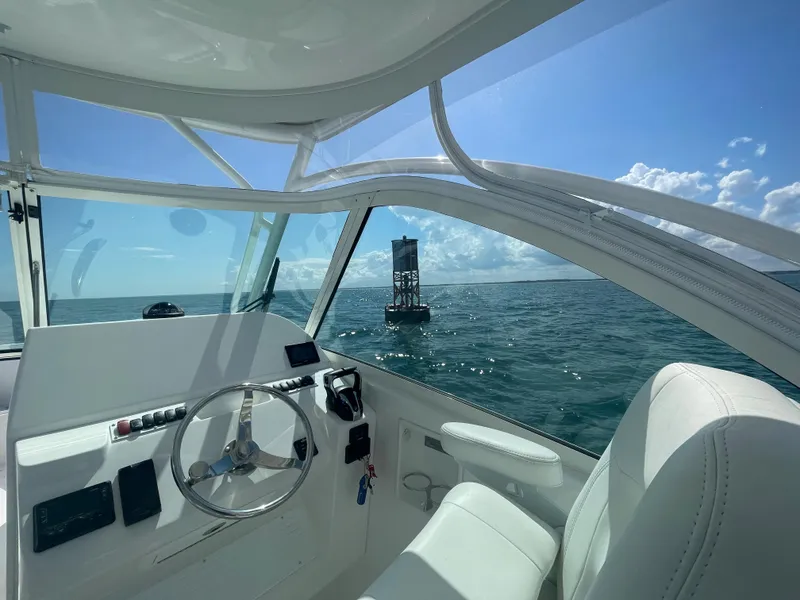 Slide: The Image of Yamaha display on 2022 Albemarle 27 DC boat showing engine RPM and speed. - 18