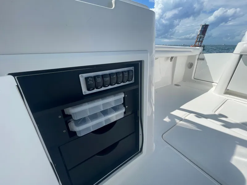 Slide: The Image of Albemarle 27 DC 2022 boat sink with ocean view and buoy in background. - 20