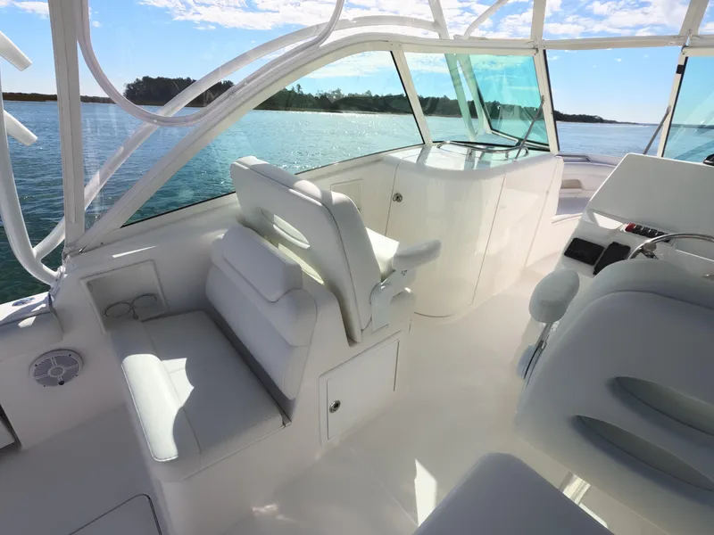 Slide: The Image of 2022 Albemarle 27 DC boat interior bathroom with toilet and countertop. - 26