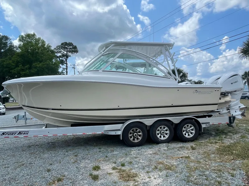 Slide: The Image of 2022 Albemarle 27 DC boat with dual engines on calm water. - 39