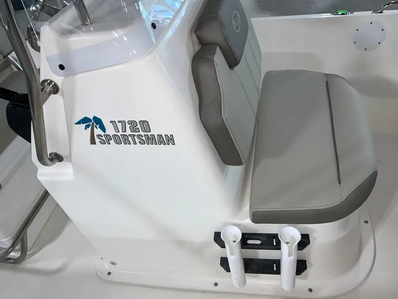 Slide: The Image of 2024 Key West 1720 Sportsman boat interior with seating and rod holders. - 10