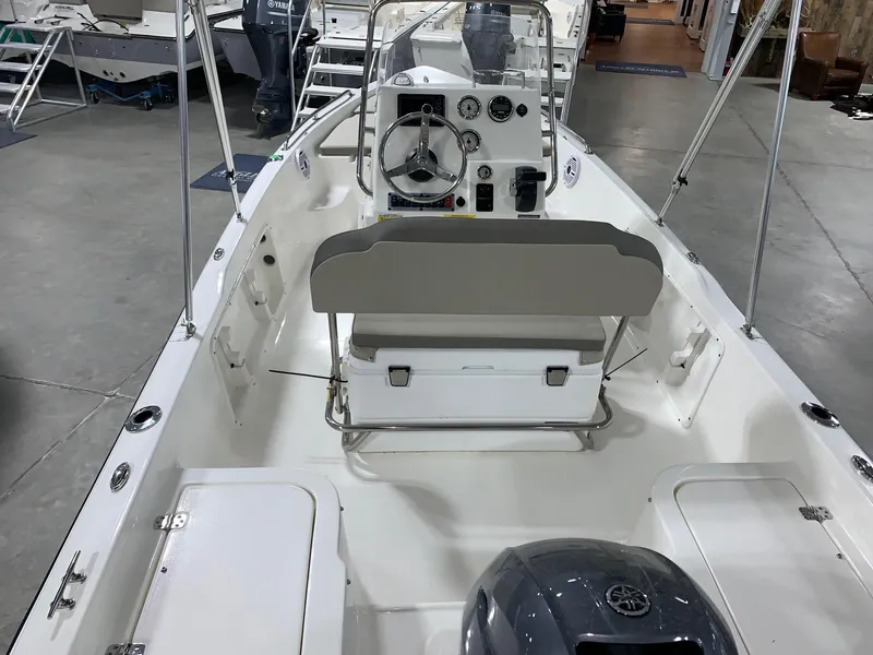 Slide: The Image of 2024 Key West 1720 Sportsman boat interior with console and seating. - 17