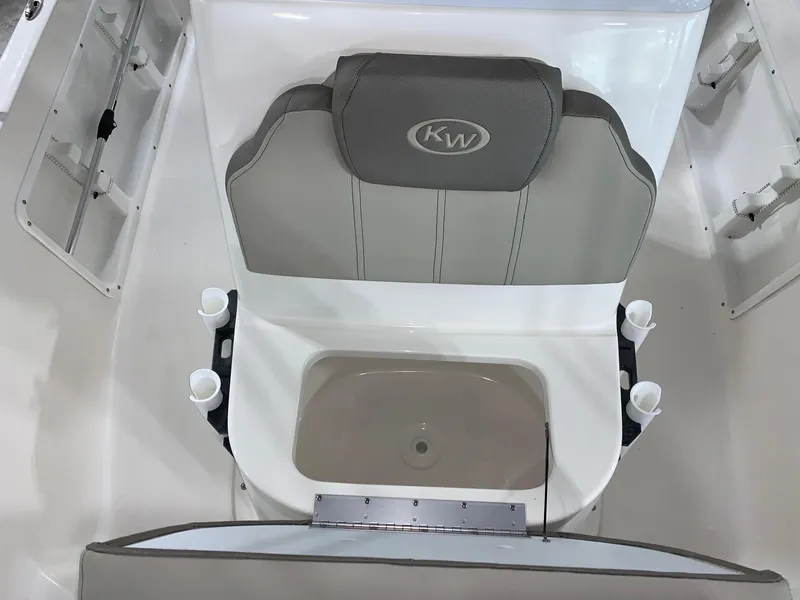 Slide: The Image of 2024 Key West 1720 Sportsman boat seat with integrated storage and rod holders. - 9