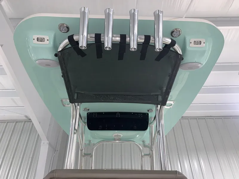 Slide: The Image of 2024 Key West 239 FS boat with rod holders and storage net. - 3