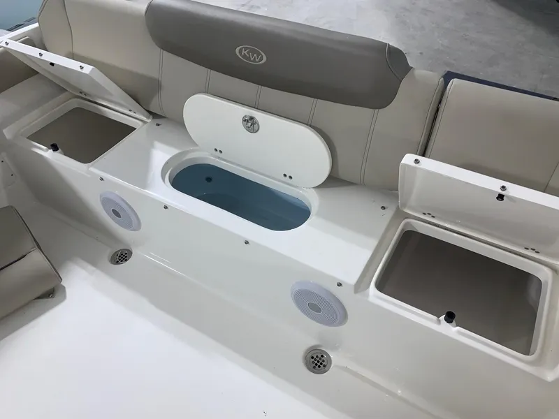 Slide: The Image of 2024 Key West 239 FS boat interior with storage compartments and seating. - 8
