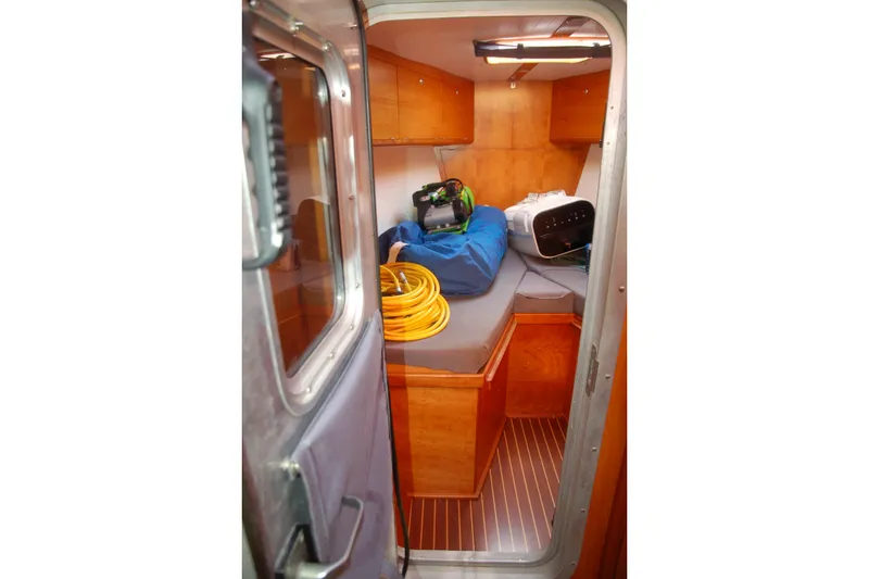Slide: The Image of Interior of 2000 Garcia 48 Raised Salon yacht with storage and equipment. - 72