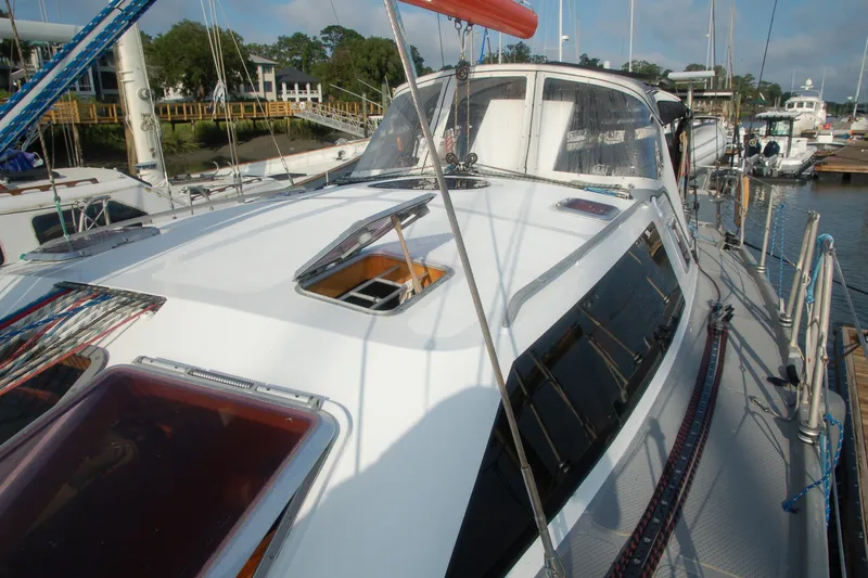 Slide: The Image of Sailboat Garcia 48 Raised Salon 2000 docked, showcasing sleek deck design and windows. - 21