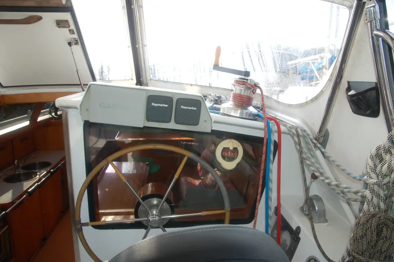 Slide: The Image of Interior view of 2000 Garcia 48 Raised Salon yacht cockpit with navigation equipment. - 31