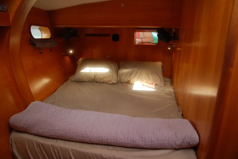 Slide: The Image of Cozy cabin bedroom in 2000 Garcia 48 Raised Salon yacht with wooden interior. - 71