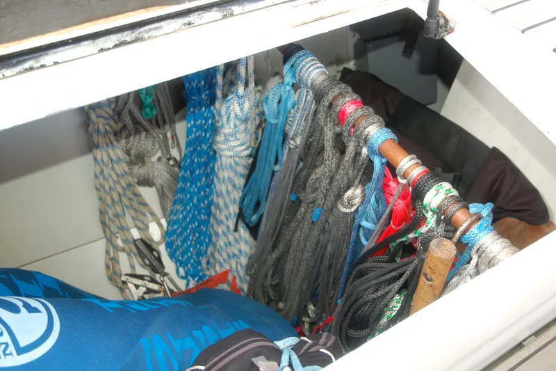 Slide: The Image of Storage compartment with neatly organized ropes on a 2000 Garcia 48 Raised Salon yacht. - 43