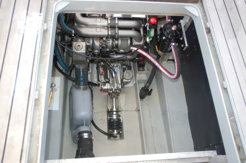 Slide: The Image of Engine compartment of a 2000 Garcia 48 Raised Salon yacht, showcasing mechanical components. - 37