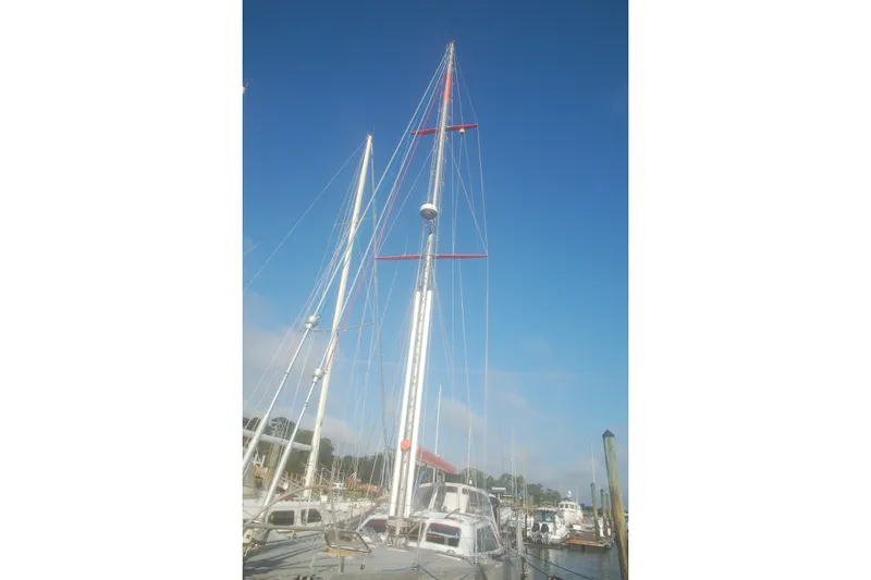 Slide: The Image of Sailboat Garcia 48 Raised Salon 2000 docked at marina under clear blue sky. - 23