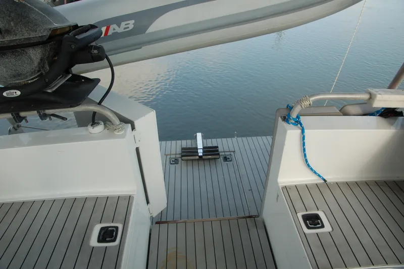 Slide: The Image of Deck of 2000 Garcia 48 Raised Salon yacht with grill and seating area. - 29