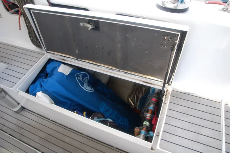 Slide: The Image of Open storage compartment on 2000 Garcia 48 Raised Salon yacht deck. - 42