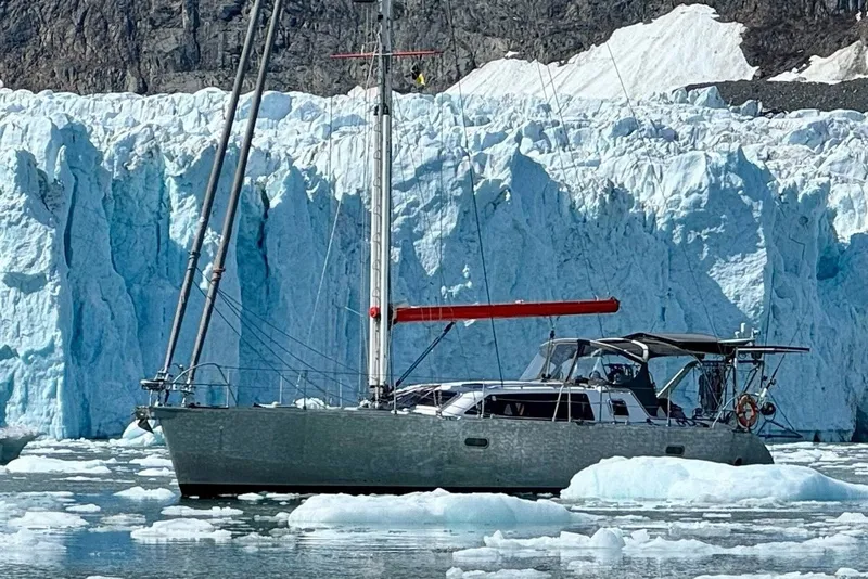 The Image of Sailing yacht Garcia 48 Raised Salon navigating icy waters near a glacier. - 0