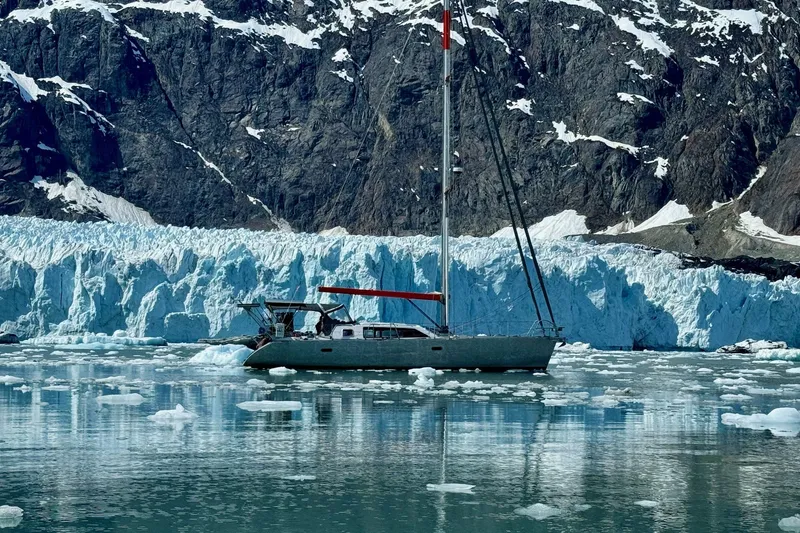 Slide: The Image of Sailboat Garcia 48 Raised Salon 2000 near icy glacier and rugged cliffs. - 82