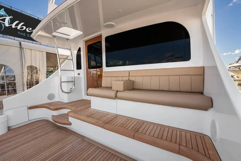 Slide: The Image of Luxurious 2026 Albemarle 53 Spencer yacht with elegant seating and teak flooring. - 13