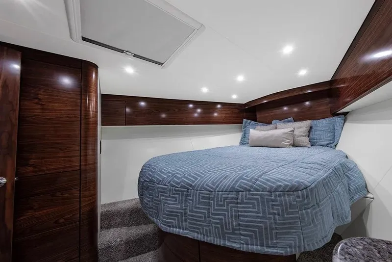 Slide: The Image of Luxurious cabin interior of 2026 Albemarle 53 Spencer yacht with elegant wood finish. - 8