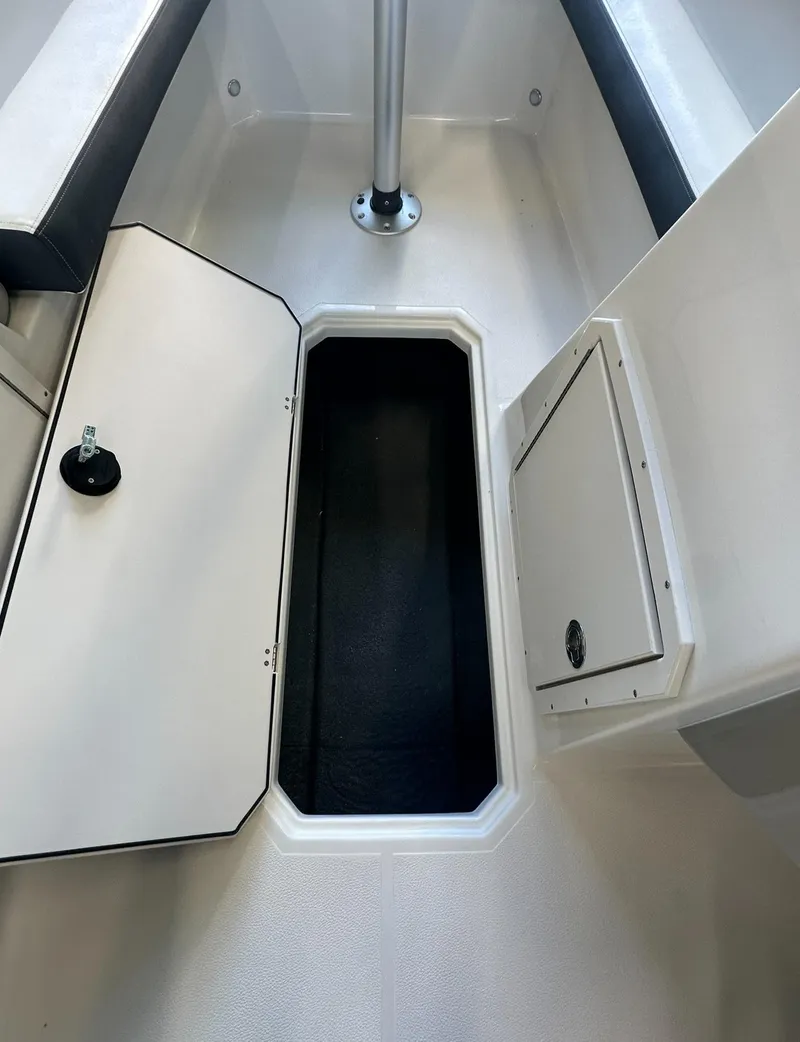 Slide: The Image of Dashboard of 2026 Starcraft SVX 191 OB boat with steering wheel and Humminbird display. - 14