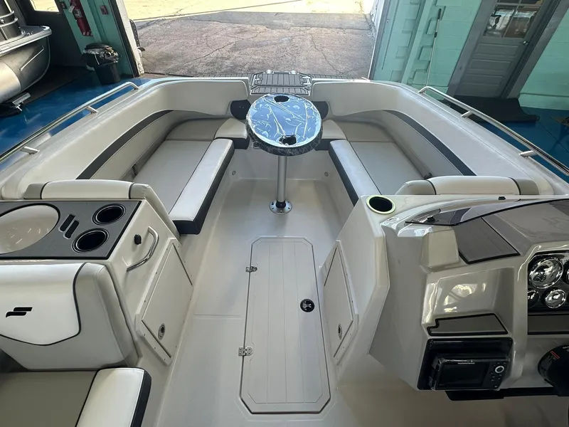 Slide: The Image of 2026 Starcraft SVX 191 OB boat storage compartment with open hatch and secure latch. - 18