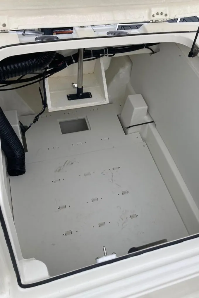 Slide: The Image of 2024 Bayliner VR5 boat storage compartment with open hatch. - 11