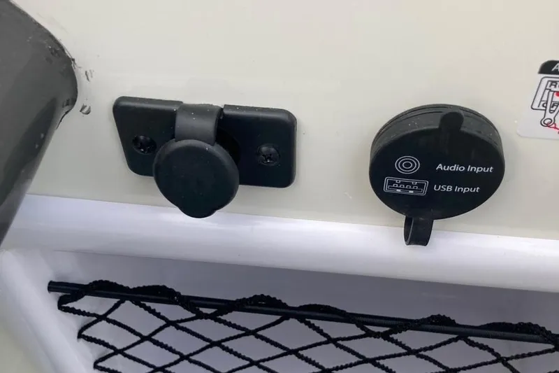 Slide: The Image of Audio and USB input panel on 2024 Bayliner VR5 boat. - 9