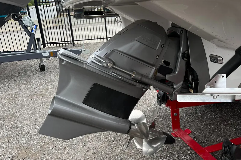 Slide: The Image of Close-up of the 2022 Regal LS2 Surf boat's outboard motor and propeller. - 8