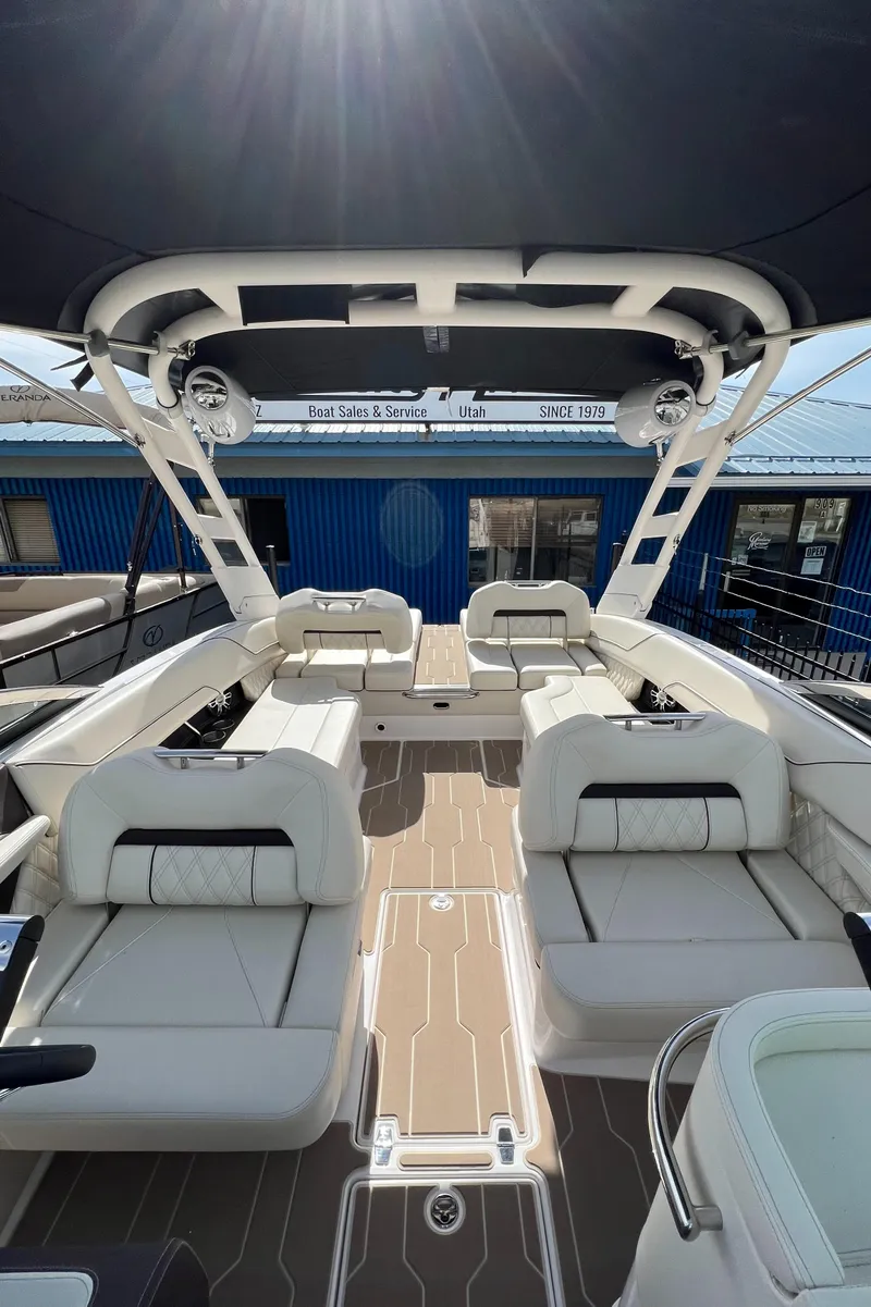 Slide: The Image of 2022 Regal LS6 Surf boat interior with luxurious seating and modern design. - 3