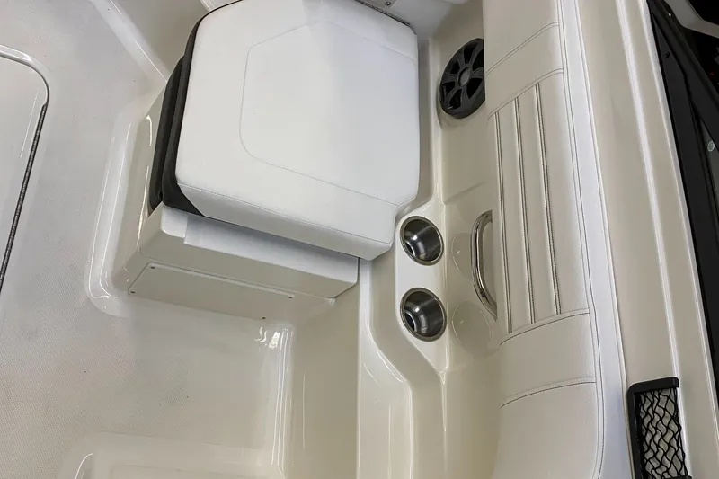 Slide: The Image of 2019 Sea Ray 190 SPX BR interior seating and cup holders. - 13