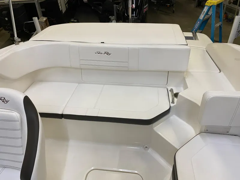 Slide: The Image of 2019 Sea Ray 190 SPX BR boat interior with white seating. - 15