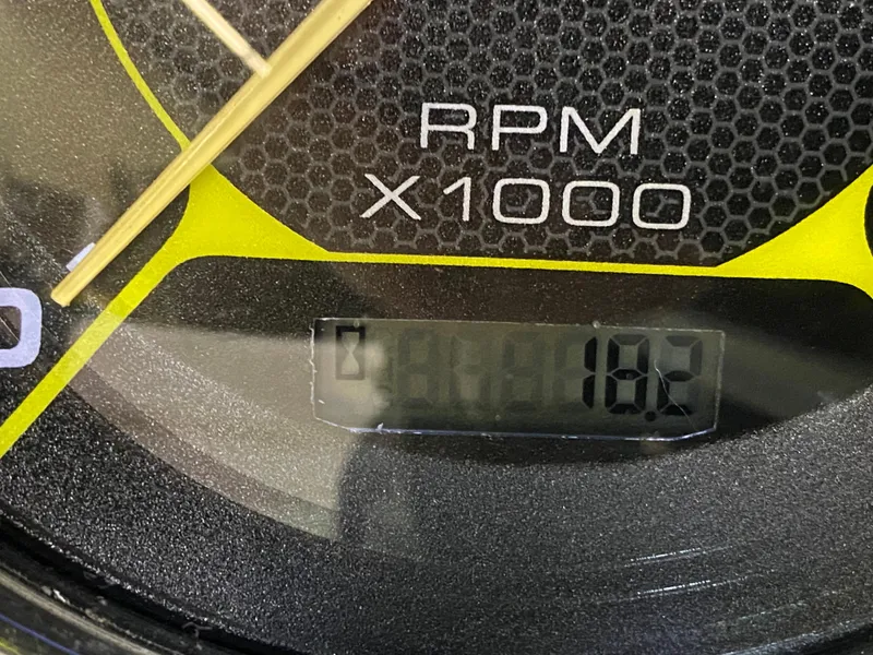 Slide: The Image of Close-up of 2019 Sea Ray 190 SPX BR tachometer showing 18.2 hours. - 20