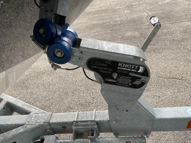 Slide: The Image of Close-up of a 2019 Sea Ray 190 SPX BR boat trailer hitch mechanism. - 22