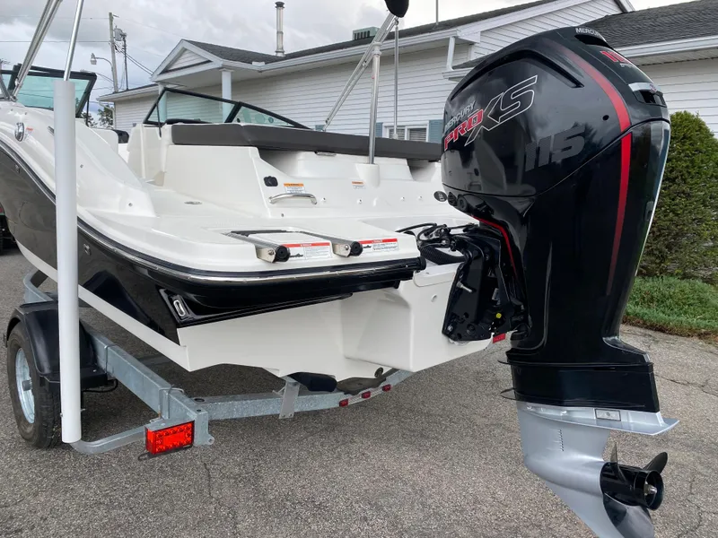 Slide: The Image of 2019 Sea Ray 190 SPX BR boat with outboard motor on trailer. - 4