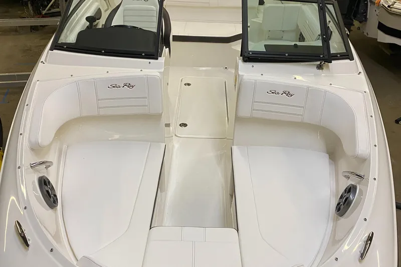 Slide: The Image of 2019 Sea Ray 190 SPX BR boat interior with white seating and black accents. - 8