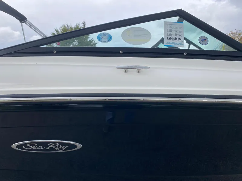 Slide: The Image of 2019 Sea Ray 190 SPX BR boat, close-up of the logo and windshield. - 9