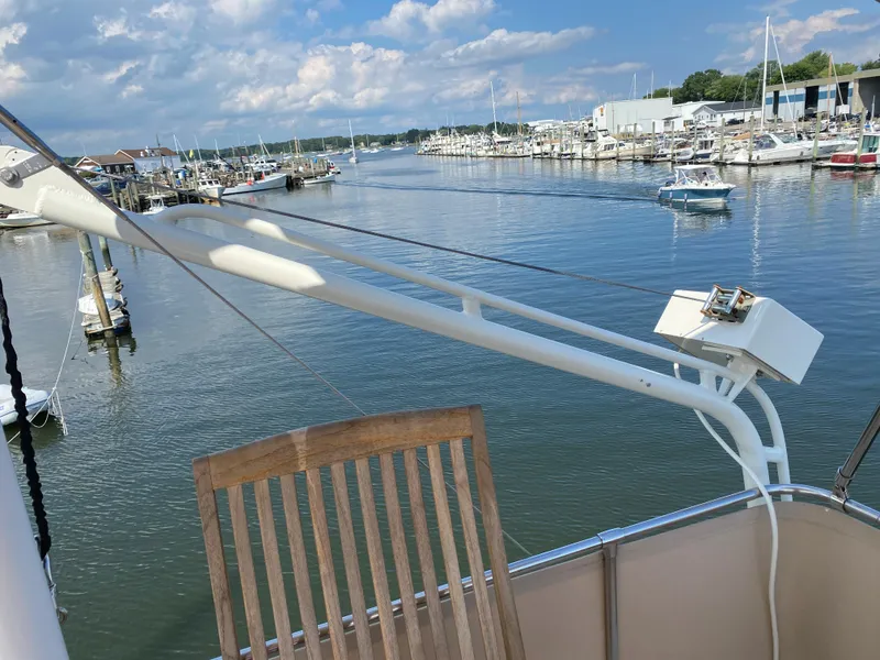 Slide: The Image of View from 1973 Chris-Craft 47 Commander Flush Deck overlooking marina and calm waters. - 32