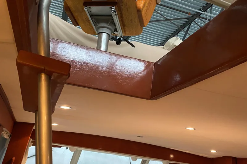 Slide: The Image of Interior view of 1973 Chris-Craft 47 Commander Flush Deck with polished wood and metal details. - 43