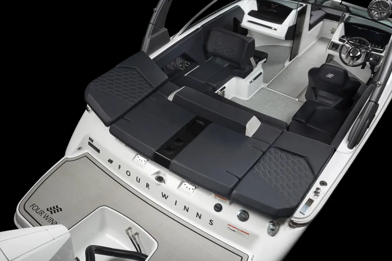 Slide: The Image of 2023 Four Winns H2 OB boat interior with seating and dashboard. - 35