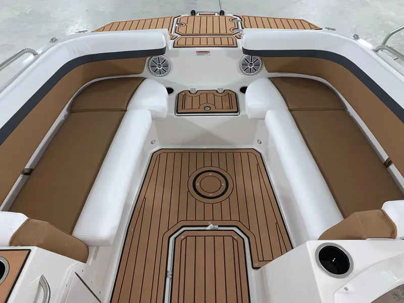 Slide: The Image of 2024 Starcraft SVX 191 boat interior with tan and white seating. - 11