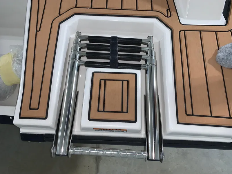 Slide: The Image of 2024 Starcraft SVX 191 boat with foldable stainless steel ladder. - 12