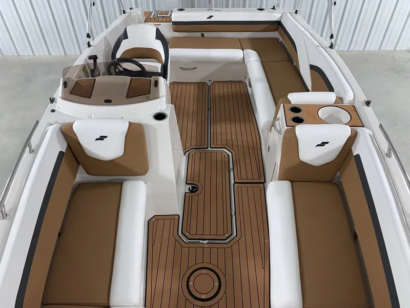 Slide: The Image of 2024 Starcraft SVX 191 boat interior with tan and white seating. - 4