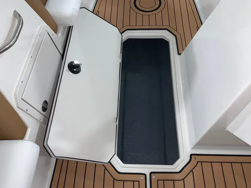 Slide: The Image of 2024 Starcraft SVX 191 boat storage compartment with open hatch. - 8
