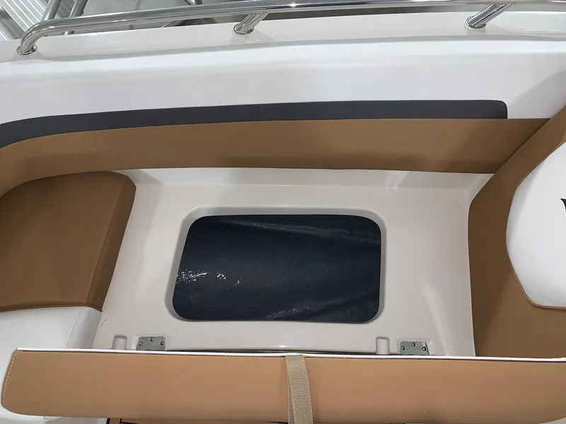 Slide: The Image of 2024 Starcraft SVX 191 boat interior seating and storage compartment. - 9