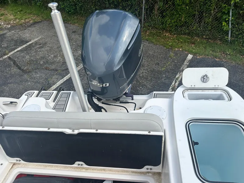 Slide: The Image of 2022 Sea Fox 248 Commander boat with outboard motor in parking lot. - 11