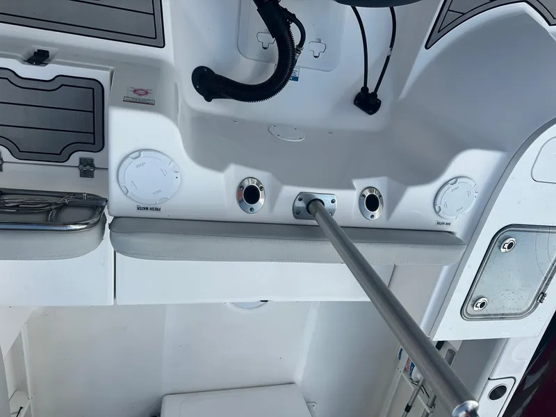 Slide: The Image of 2022 Sea Fox 248 Commander boat dashboard with controls and steering wheel. - 15