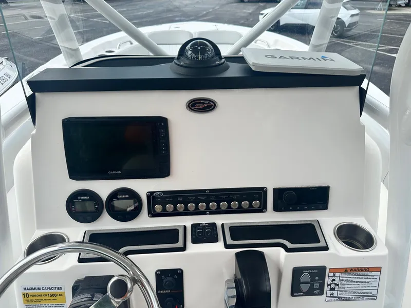 Slide: The Image of 2022 Sea Fox 248 Commander dashboard with Garmin electronics and control panel. - 21